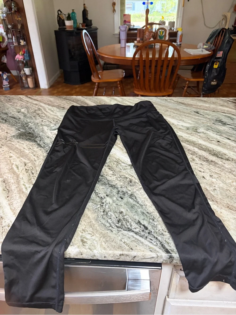 3 pairs of women’s yoga pants and one pair of skull candy leggings